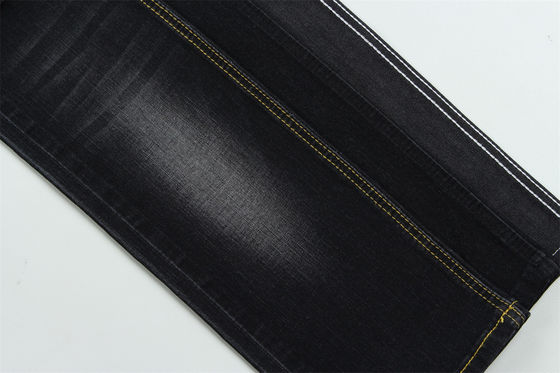 অন্ধকার কালো রঙের উচ্চ প্রসারিত স্লাব জিন্স