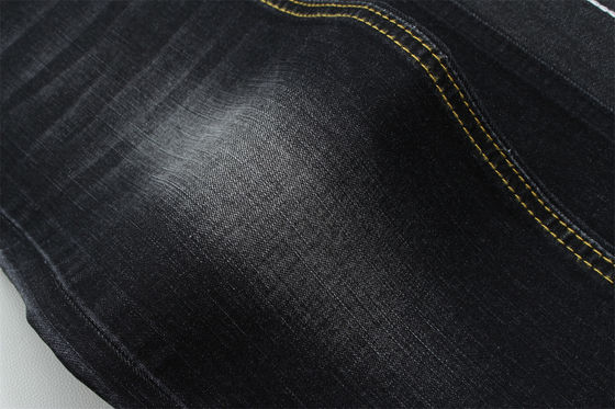 অন্ধকার কালো রঙের উচ্চ প্রসারিত স্লাব জিন্স