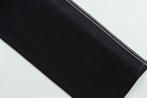 অন্ধকার কালো রঙের উচ্চ প্রসারিত স্লাব জিন্স